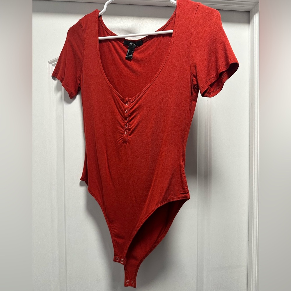 Reddish Orange Button Body suit